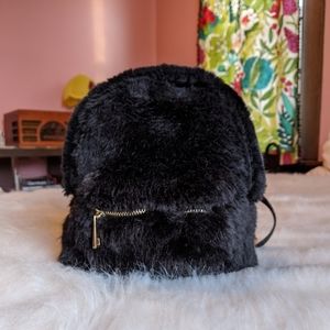 Furry black mini backpack